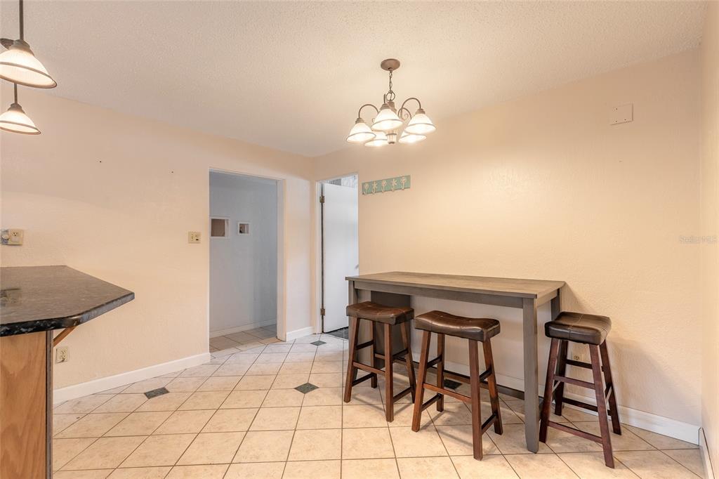 223 Charles Street Port Orange, FL 32129 - Photo 7 of 20 a view of a dining room with furniture