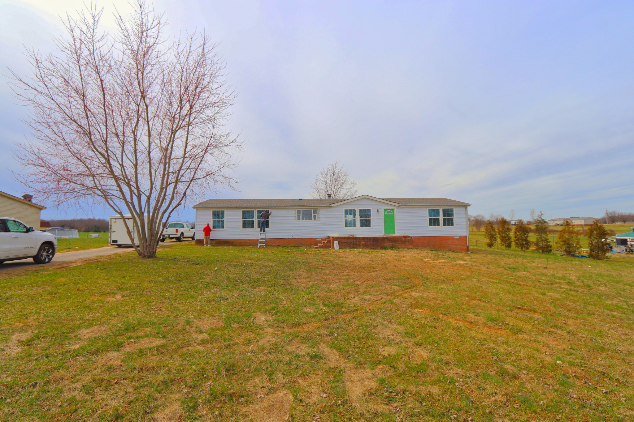 539 Cook Road Portland, TN 37148 - Photo 1 of 17 a front view of a house with a yard and swimming pool