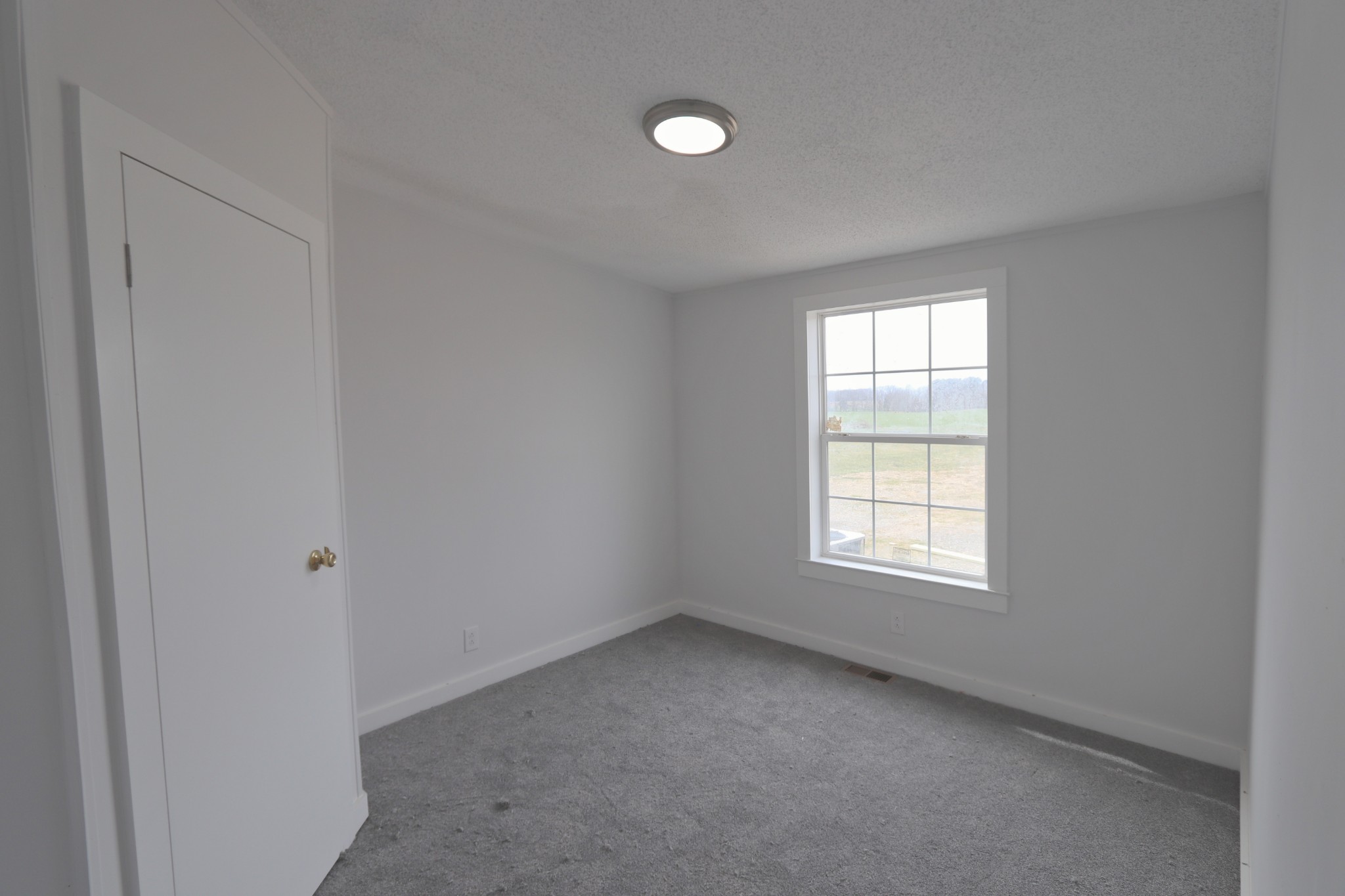 539 Cook Road Portland, TN 37148 - Photo 12 of 17 an empty room with a window