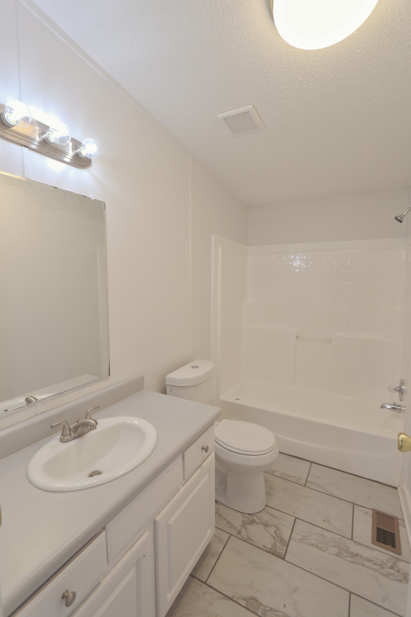 539 Cook Road Portland, TN 37148 - Photo 14 of 17 a bathroom with a granite countertop sink a toilet and a mirror