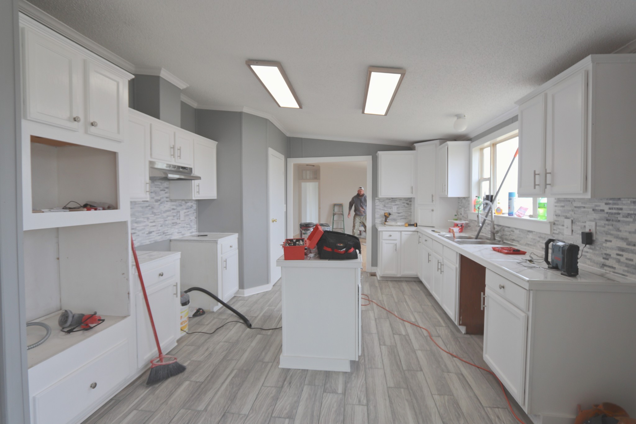 539 Cook Road Portland, TN 37148 - Photo 3 of 17 a kitchen with a sink a refrigerator and window