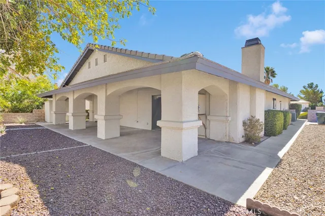 a view of house with yard