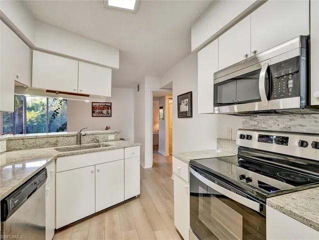 $345,000 | 114 Cypress Way East, Unit D4, Naples, FL 34110