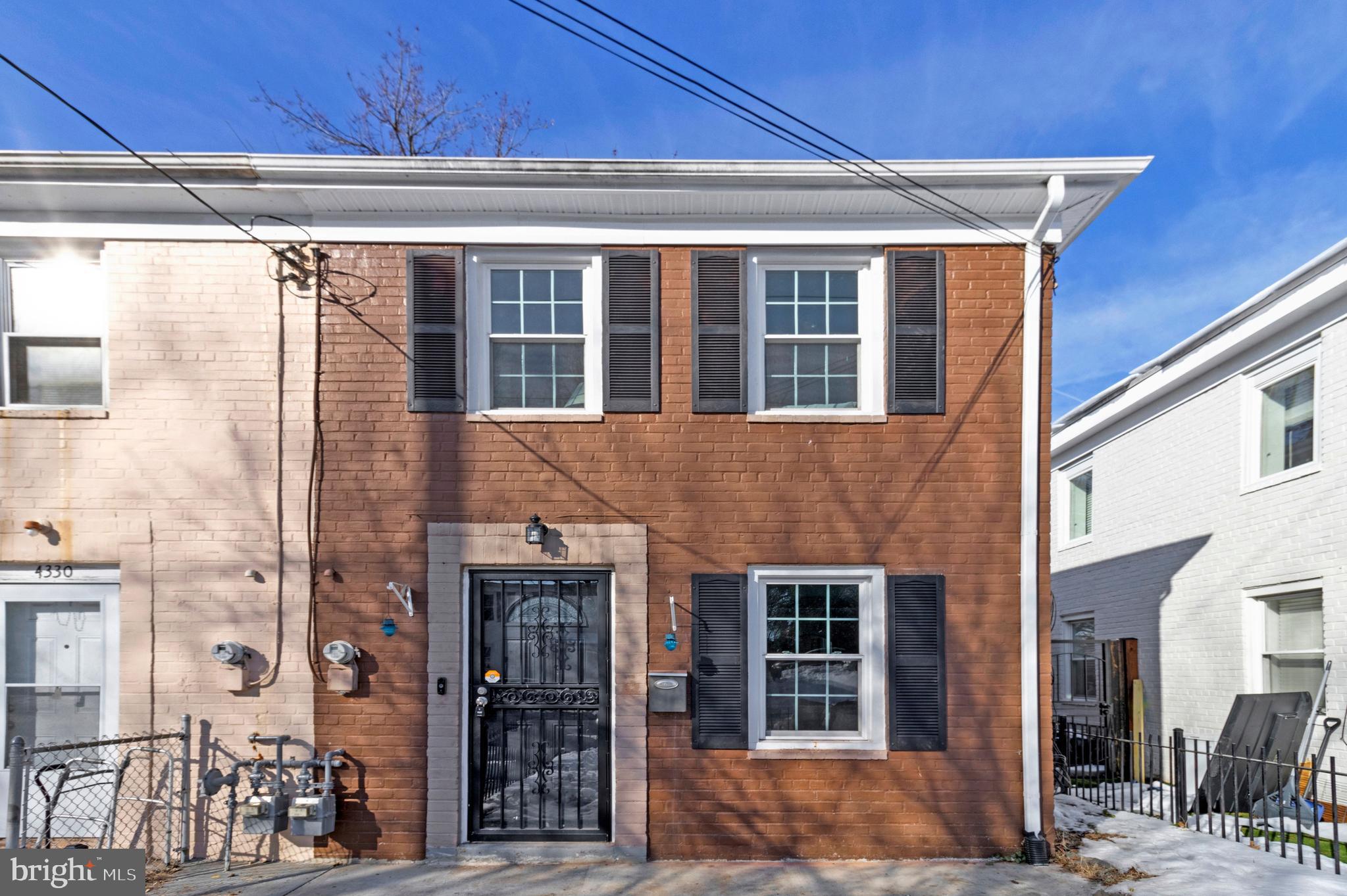 a front view of a building with glass windows