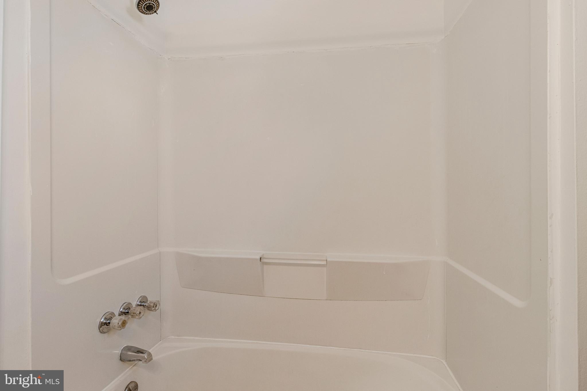 4332 Polk Street Northeast Washington, DC 20019 - Photo 15 of 22 a bathroom with a bathtub