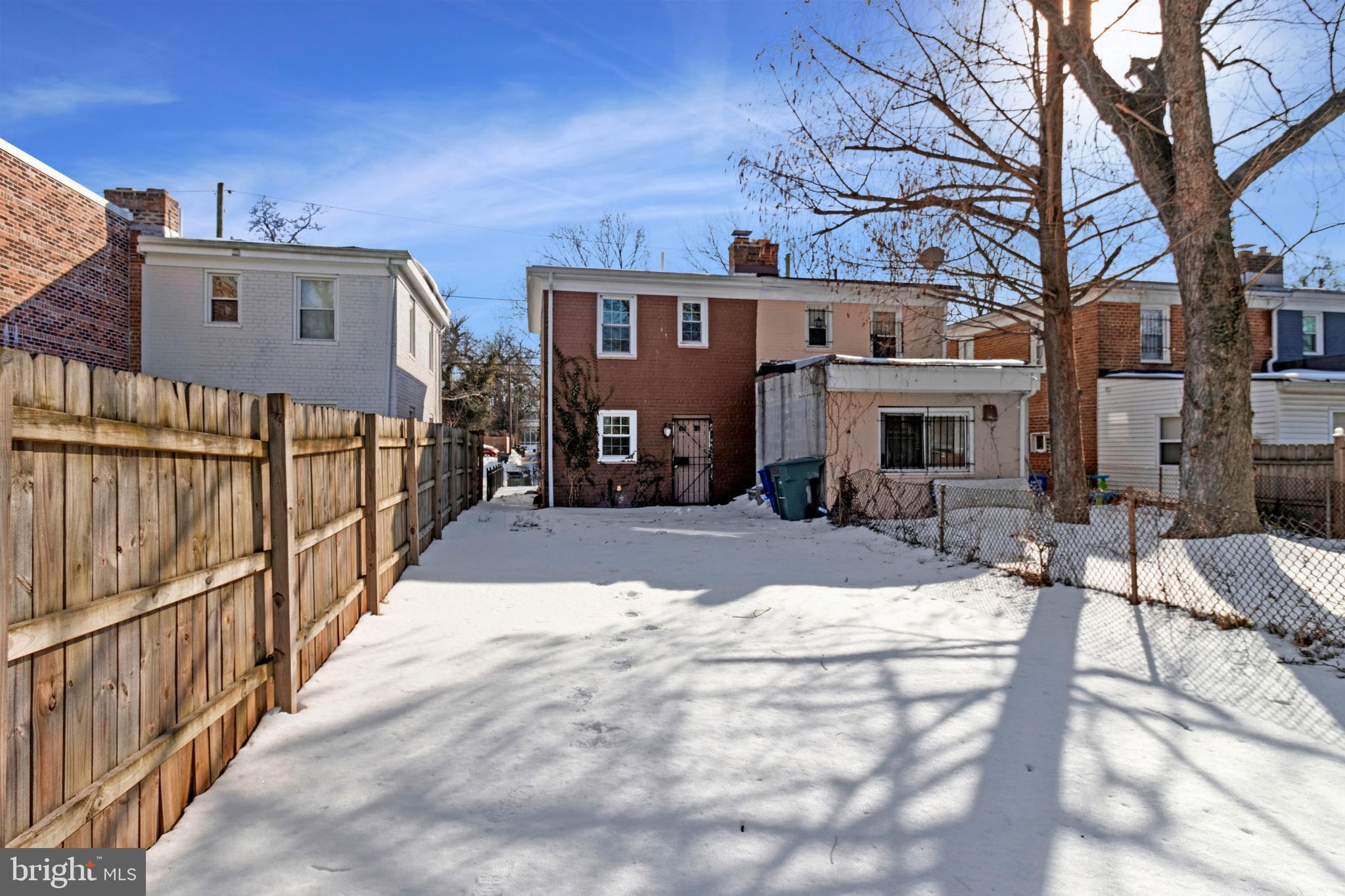 4332 Polk Street Northeast Washington, DC 20019 - Photo 21 of 22 a view of a house with a snow on the road