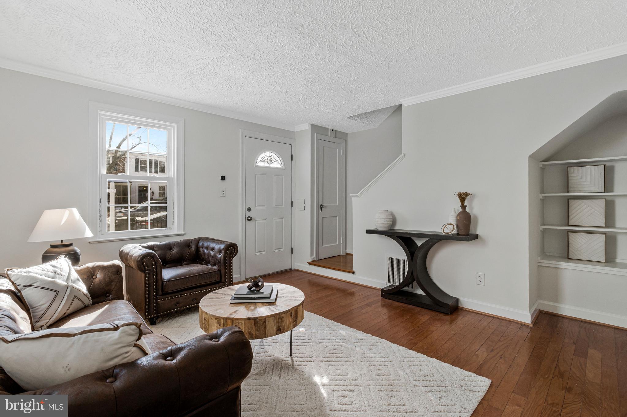 4332 Polk Street Northeast Washington, DC 20019 - Photo 5 of 22 a living room with furniture a rug and a window