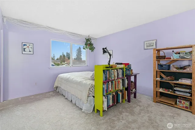 a bedroom with a bed and a walk in closet