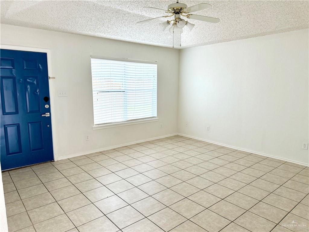 7113 North 8th Street, Unit A McAllen, TX 78504 - Photo 3 of 9 an empty room with windows