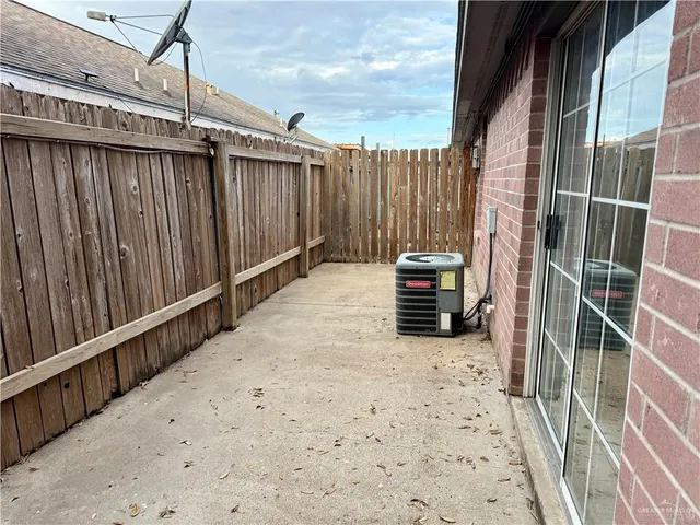 a view of stairs and wooden fence