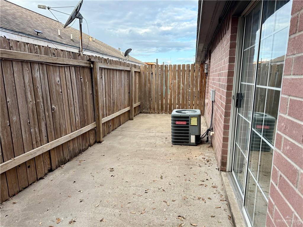 7113 North 8th Street, Unit A McAllen, TX 78504 - Photo 9 of 9 a view of stairs and wooden fence