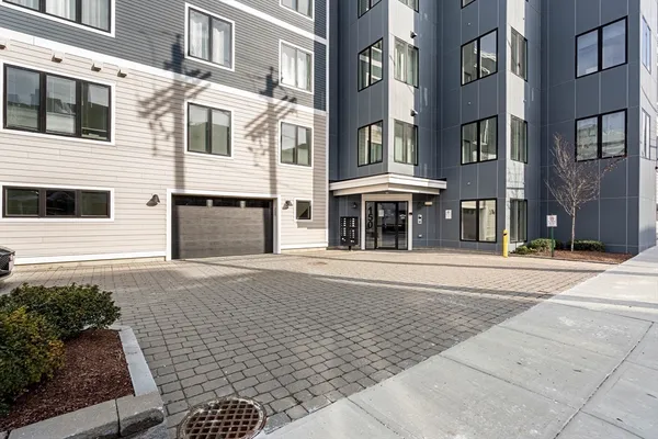 a view of a building with a street