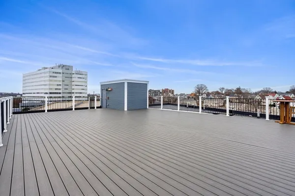 a view of a balcony with city view