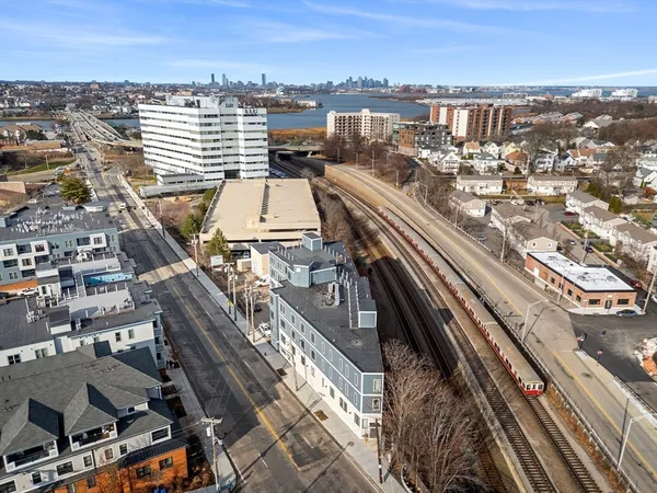 a view of parking garage with cars