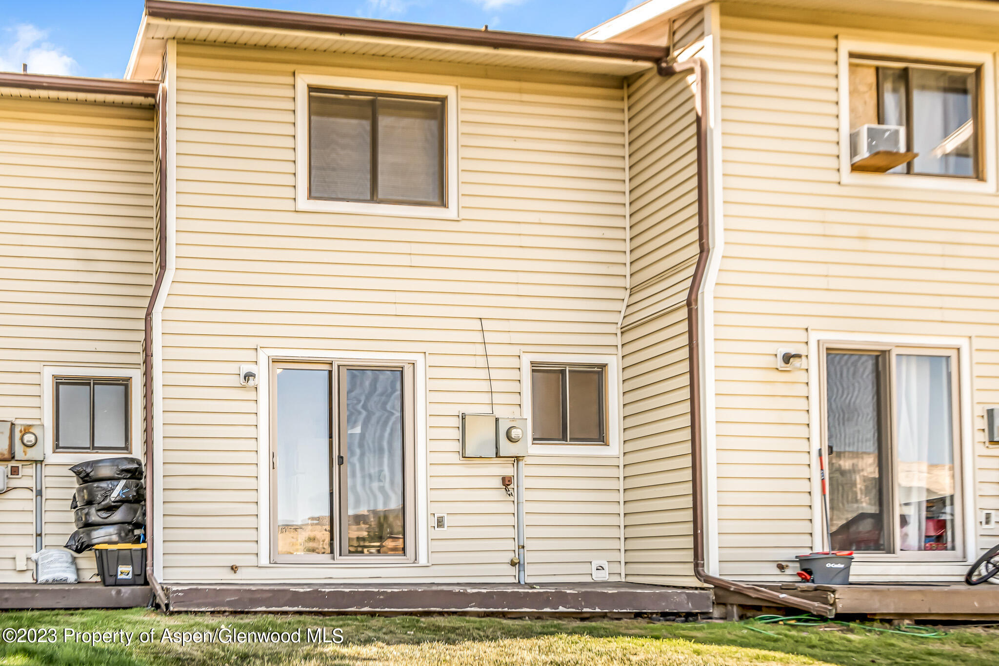 1006 Wamsley Way Rifle, CO 81650 - Photo 16 of 16 a view of a house with yard and a window