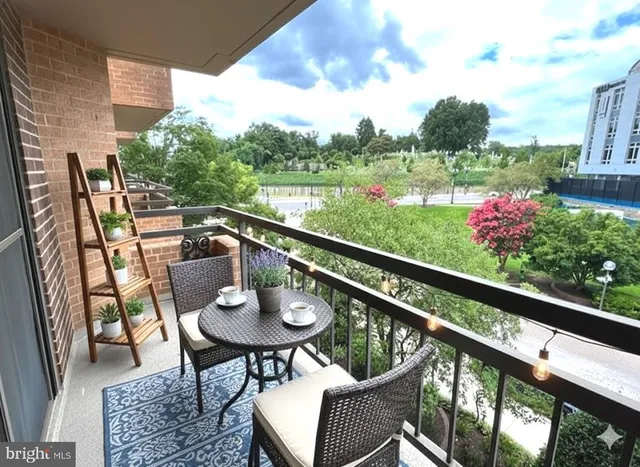 a view of a chairs and table in patio