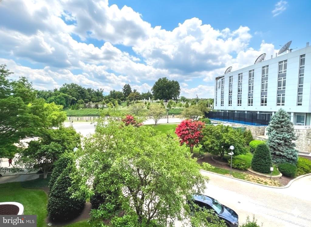2111 Wisconsin Avenue Northwest, Unit 420 Washington, DC 20007 - Photo 19 of 28 a view of a lake with a house in the background