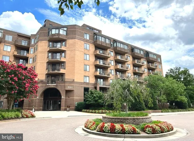 a front view of building with yard