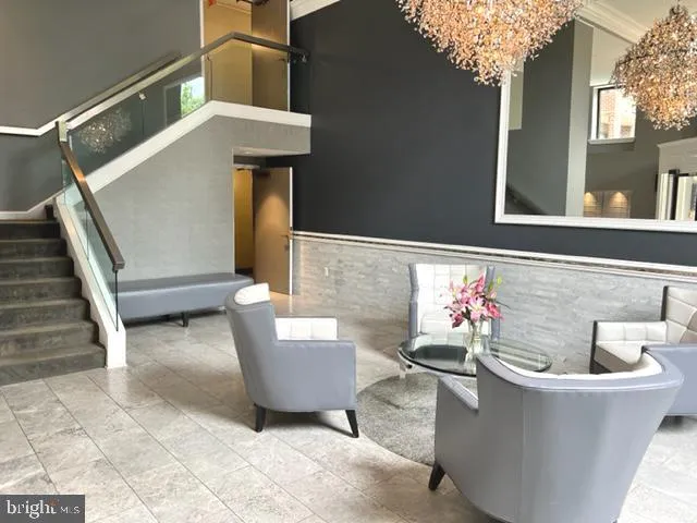 a living room with couches and furniture