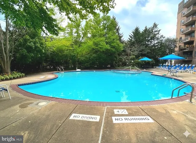 a view of a swimming pool and outdoor space