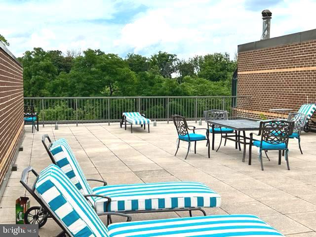 2111 Wisconsin Avenue Northwest, Unit 420 Washington, DC 20007 - Photo 28 of 28 a view of swimming pool with outdoor seating