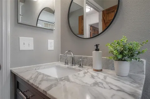 a bathroom with a toilet and shower