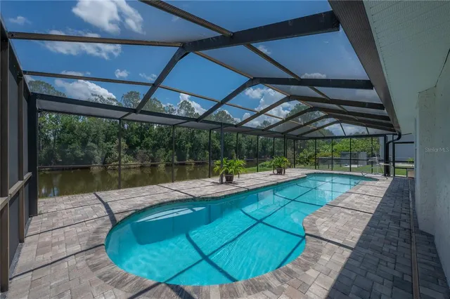 $599,999 | 6142 Caroline Drive, Wesley Chapel, FL 33545