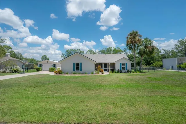 $599,999 | 6142 Caroline Drive, Wesley Chapel, FL 33545