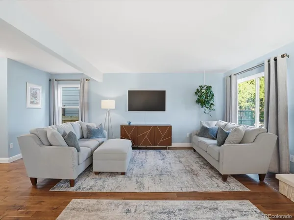 a living room with furniture and a couch