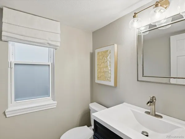 a bathroom with a sink and a toilet