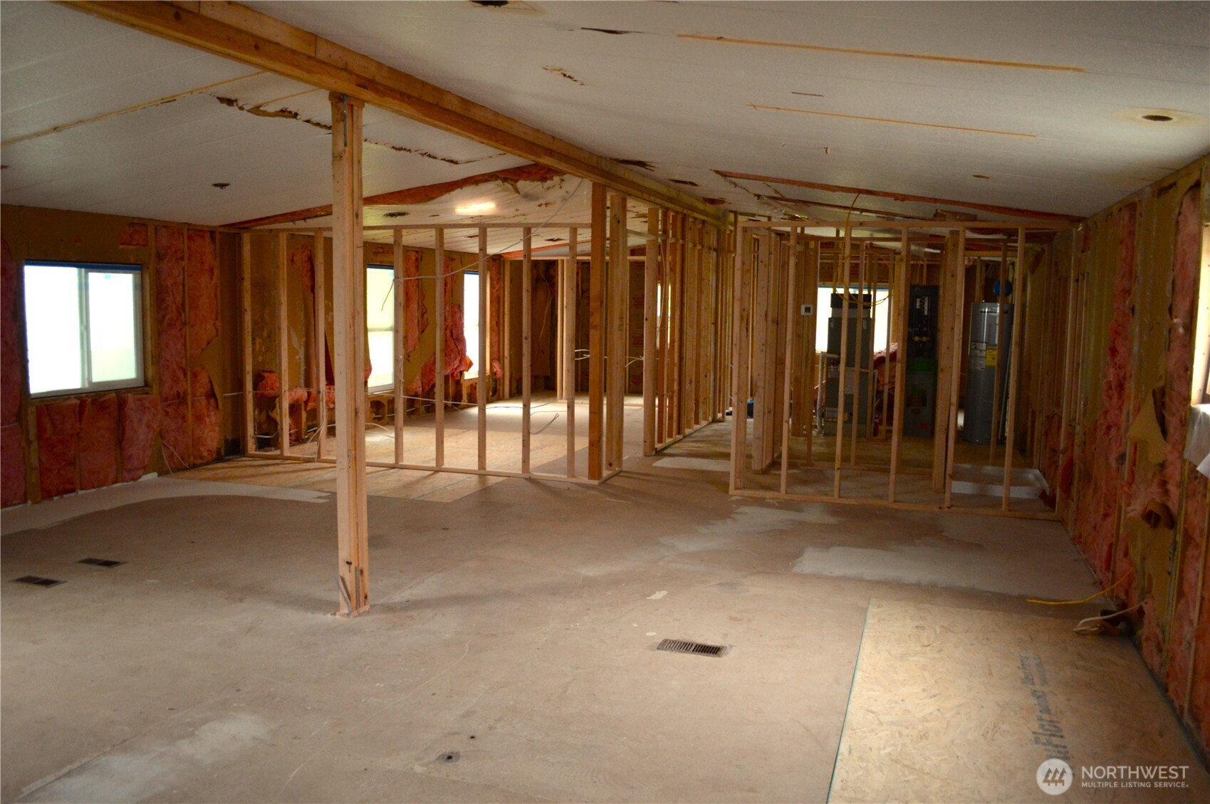 425 Chuckanut Drive North, Unit 4 Bellingham, WA 98229 - Photo 17 of 23 a view of water heater room with stairs