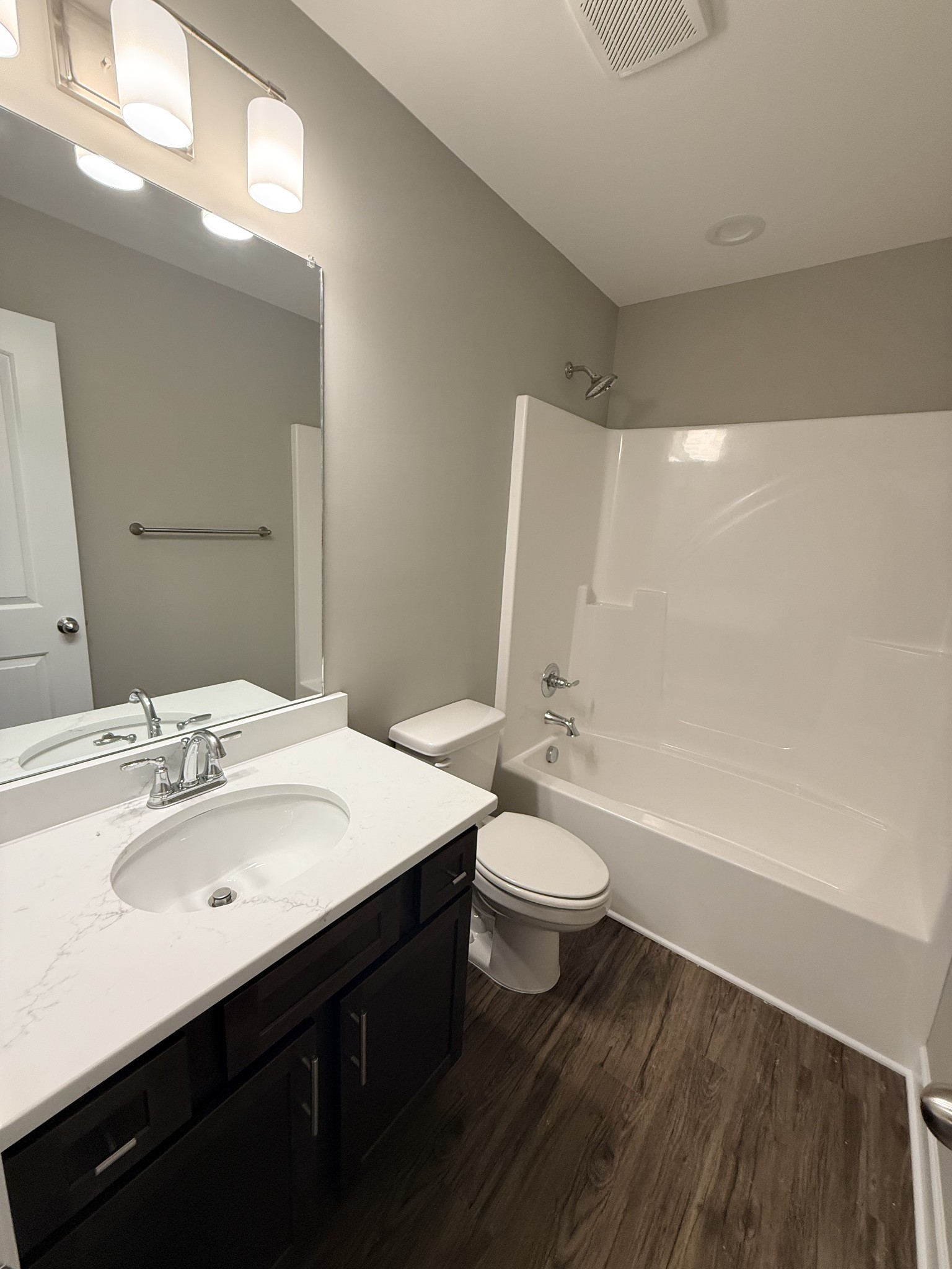 482 Ridge Street Manchester, TN 37355 - Photo 14 of 21 a bathroom with a sink a toilet and shower