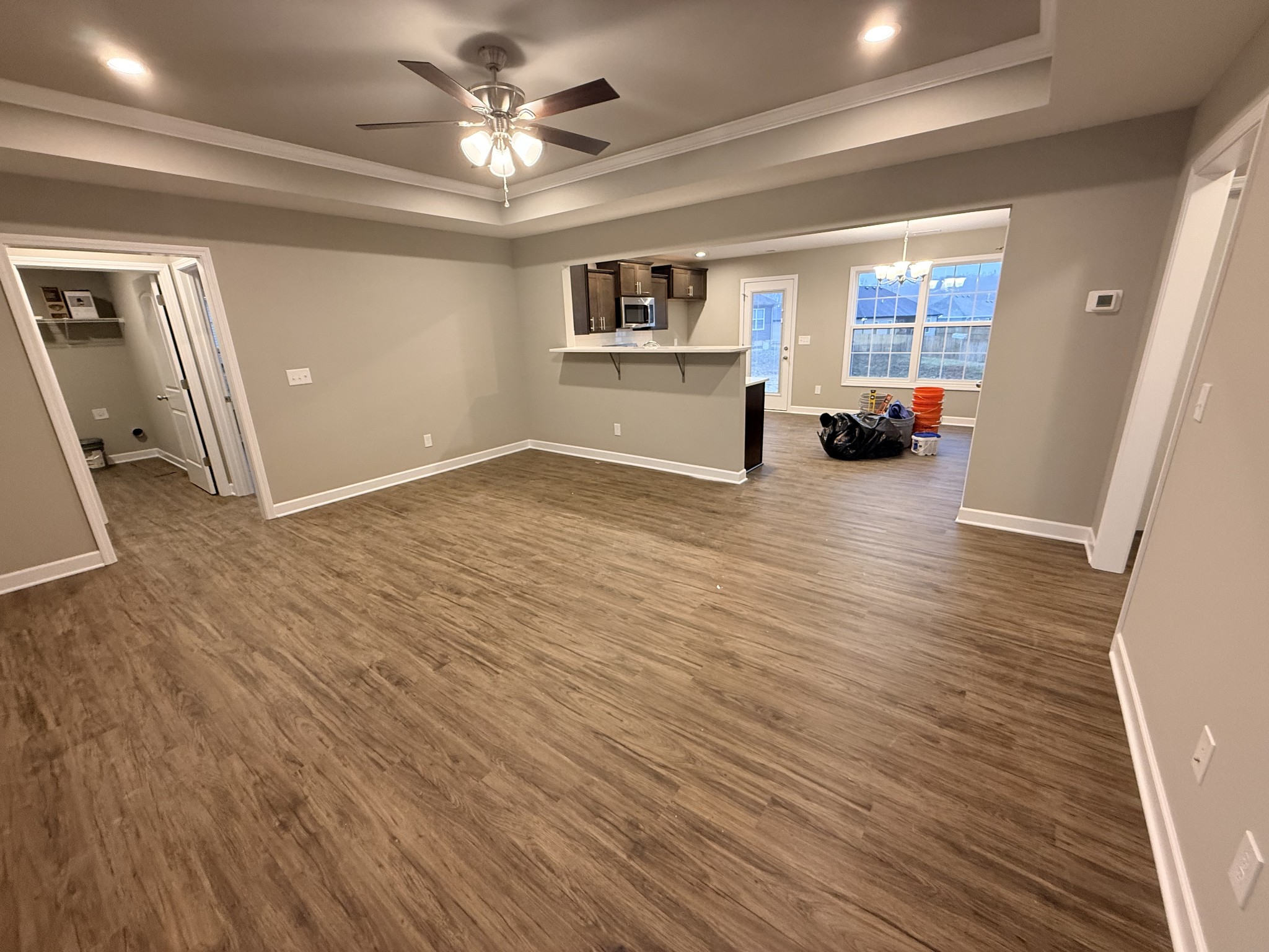 482 Ridge Street Manchester, TN 37355 - Photo 2 of 21 a view of livingroom with hardwood floor and a ceiling fan