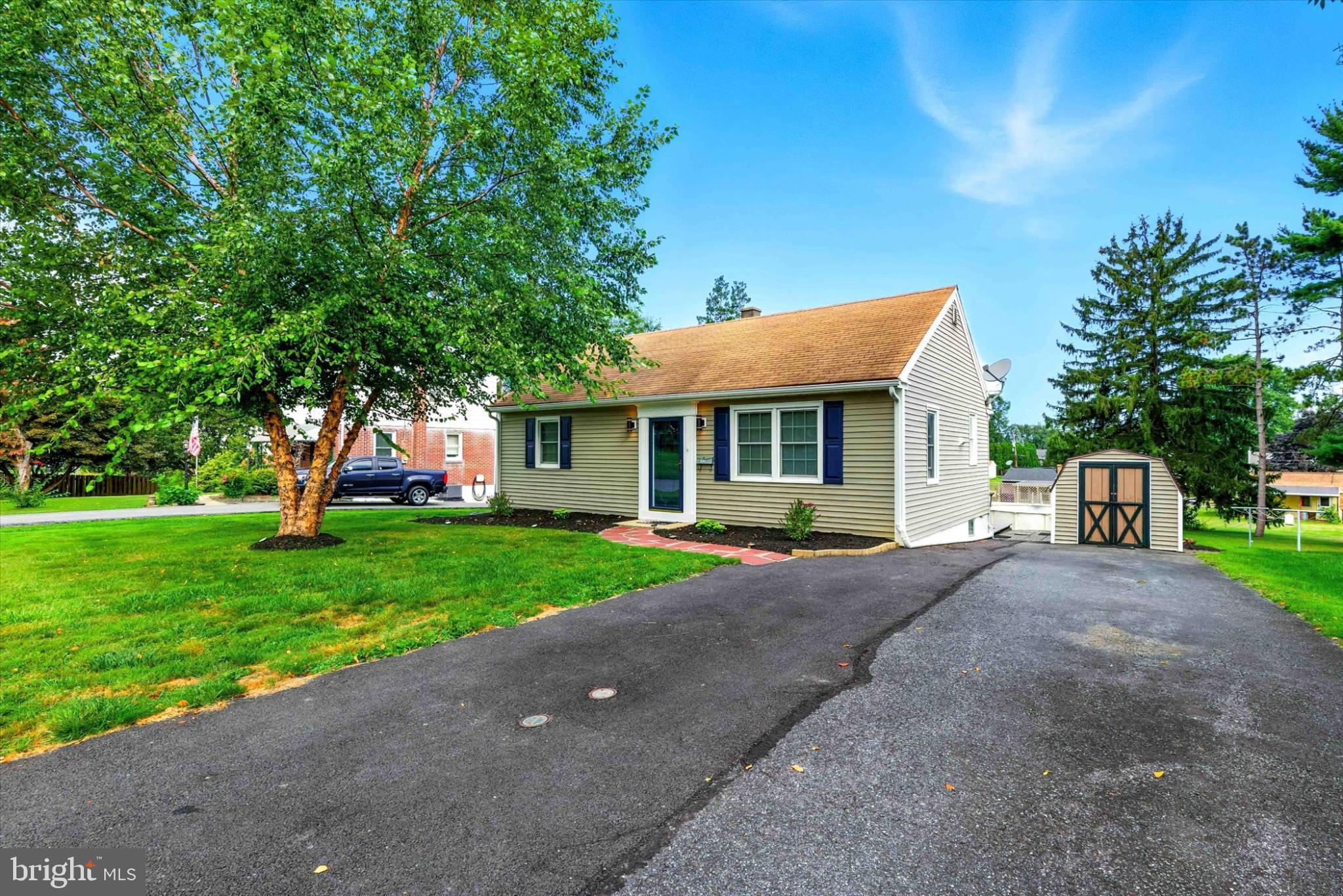 1959 Hemlock Road Lancaster, PA 17603 - Photo 3 of 22 Charming home with lush green surroundings.