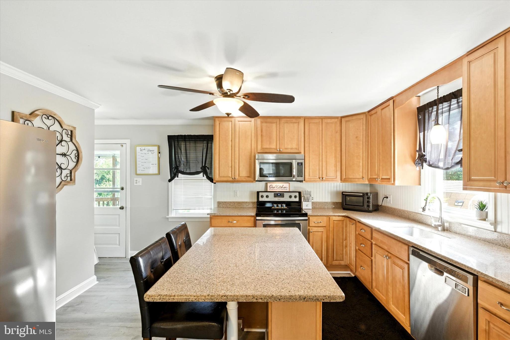 1959 Hemlock Road Lancaster, PA 17603 - Photo 10 of 22 Inviting kitchen with warm wood cabinetry.