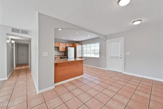 a view of livingroom with kitchen