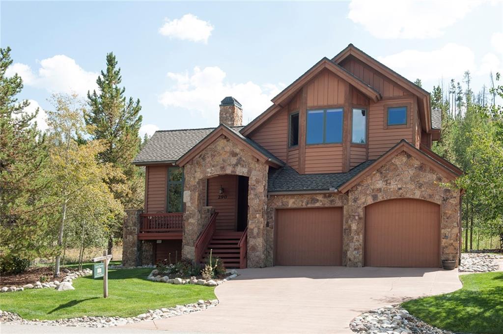 290 Elk Circle Keystone, CO 80435 - Photo 2 of 25 a front view of a house with a yard and garage