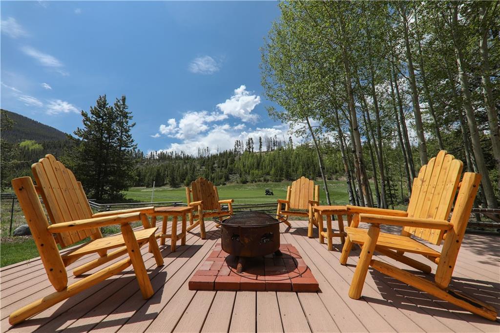 290 Elk Circle Keystone, CO 80435 - Photo 16 of 25 a view of a chairs and table on the deck