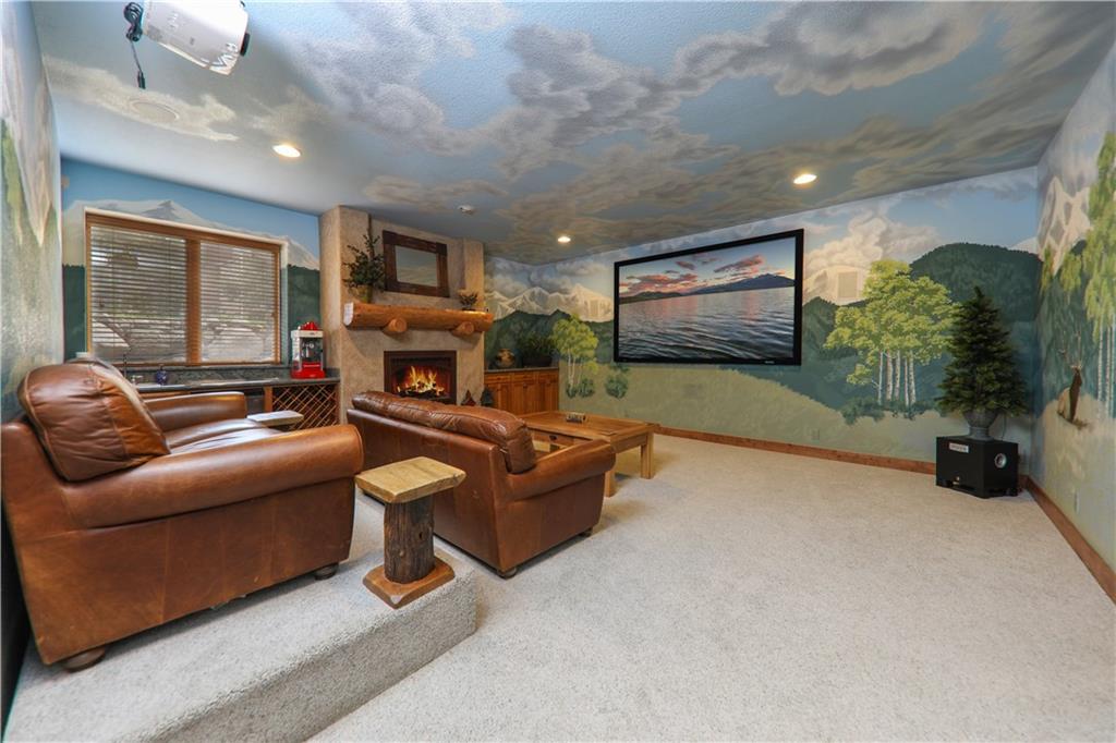 290 Elk Circle Keystone, CO 80435 - Photo 18 of 25 a living room with furniture and a fireplace