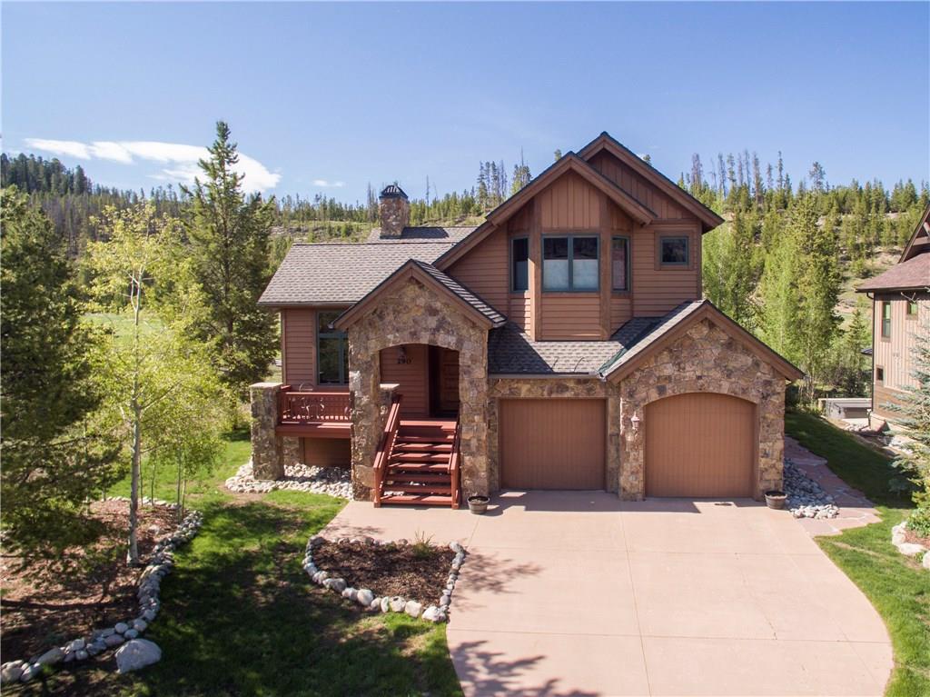 290 Elk Circle Keystone, CO 80435 - Photo 23 of 25 a front view of a house with a yard and garage