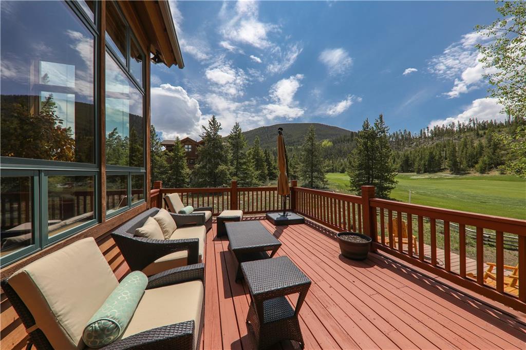 290 Elk Circle Keystone, CO 80435 - Photo 6 of 25 a view of a balcony with wooden floor and outdoor seating