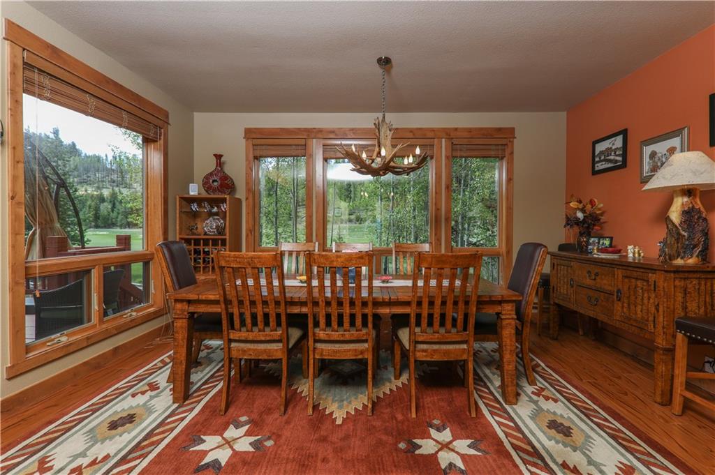 290 Elk Circle Keystone, CO 80435 - Photo 10 of 25 a view of a dining room with furniture window and outside view