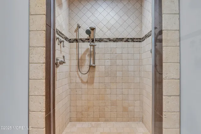 a bathroom with a sink toilet and mirror