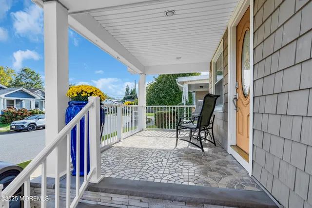 a view of stairs and wooden floor