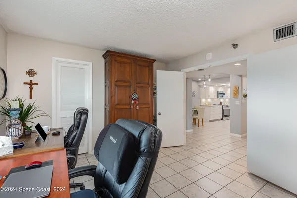 a kitchen with stainless steel appliances granite countertop a stove and a refrigerator