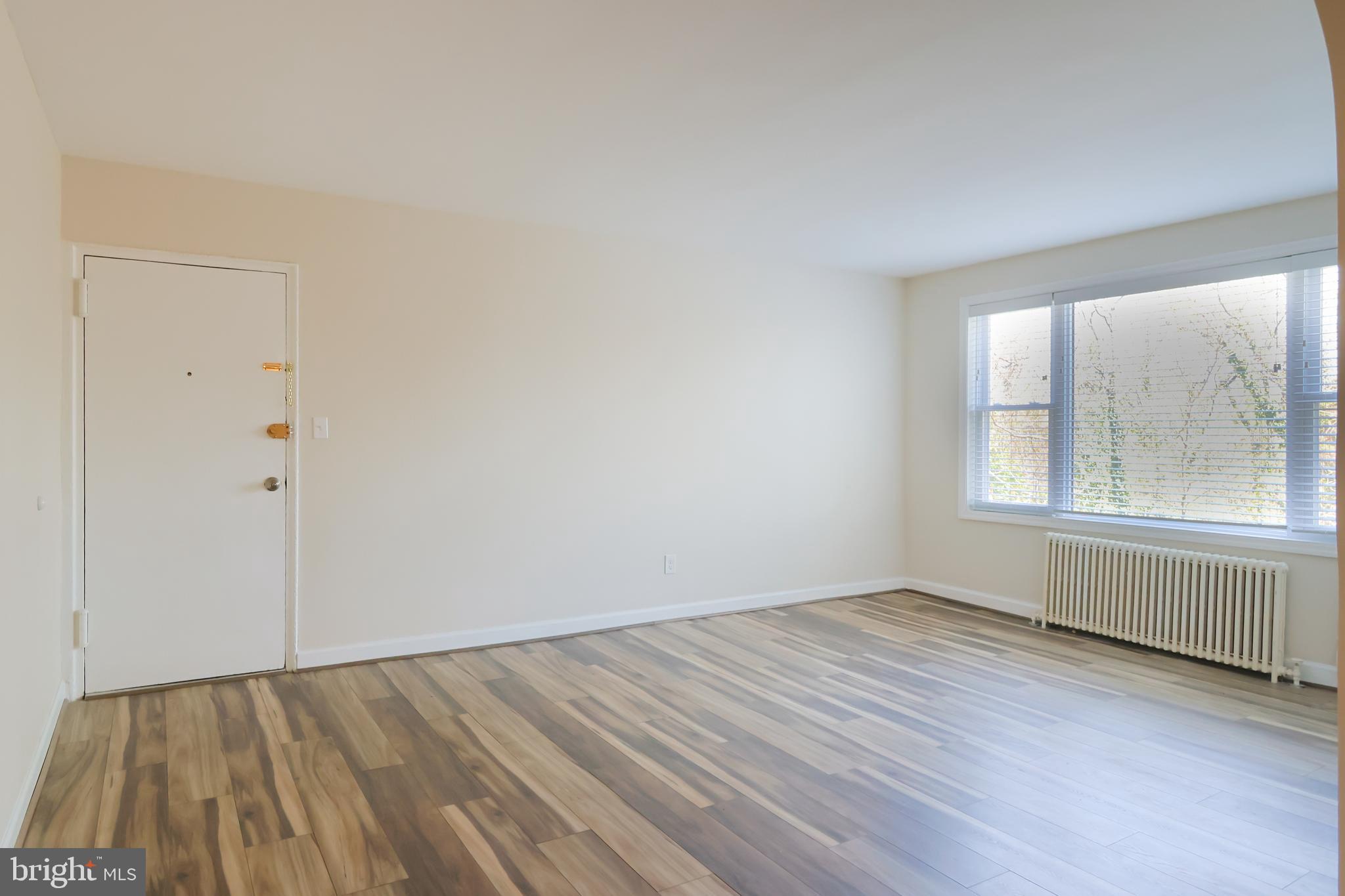 514 Ridge Road Southeast, Unit 311 Washington, DC 20019 - Photo 2 of 26 View of Living Room from Dining Area
