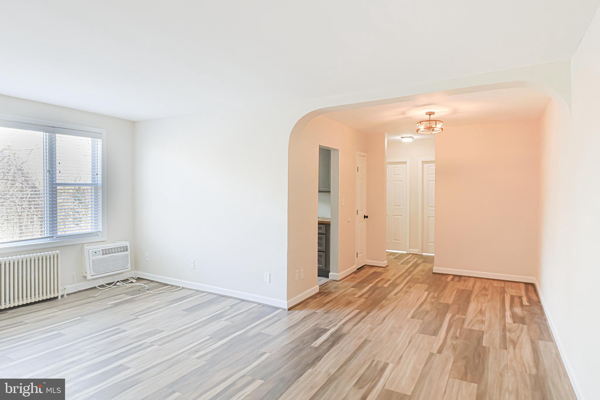 514 Ridge Road Southeast, Unit 311 Washington, DC 20019 - Photo 3 of 26 View of Living Room & Dining Area From Front Door