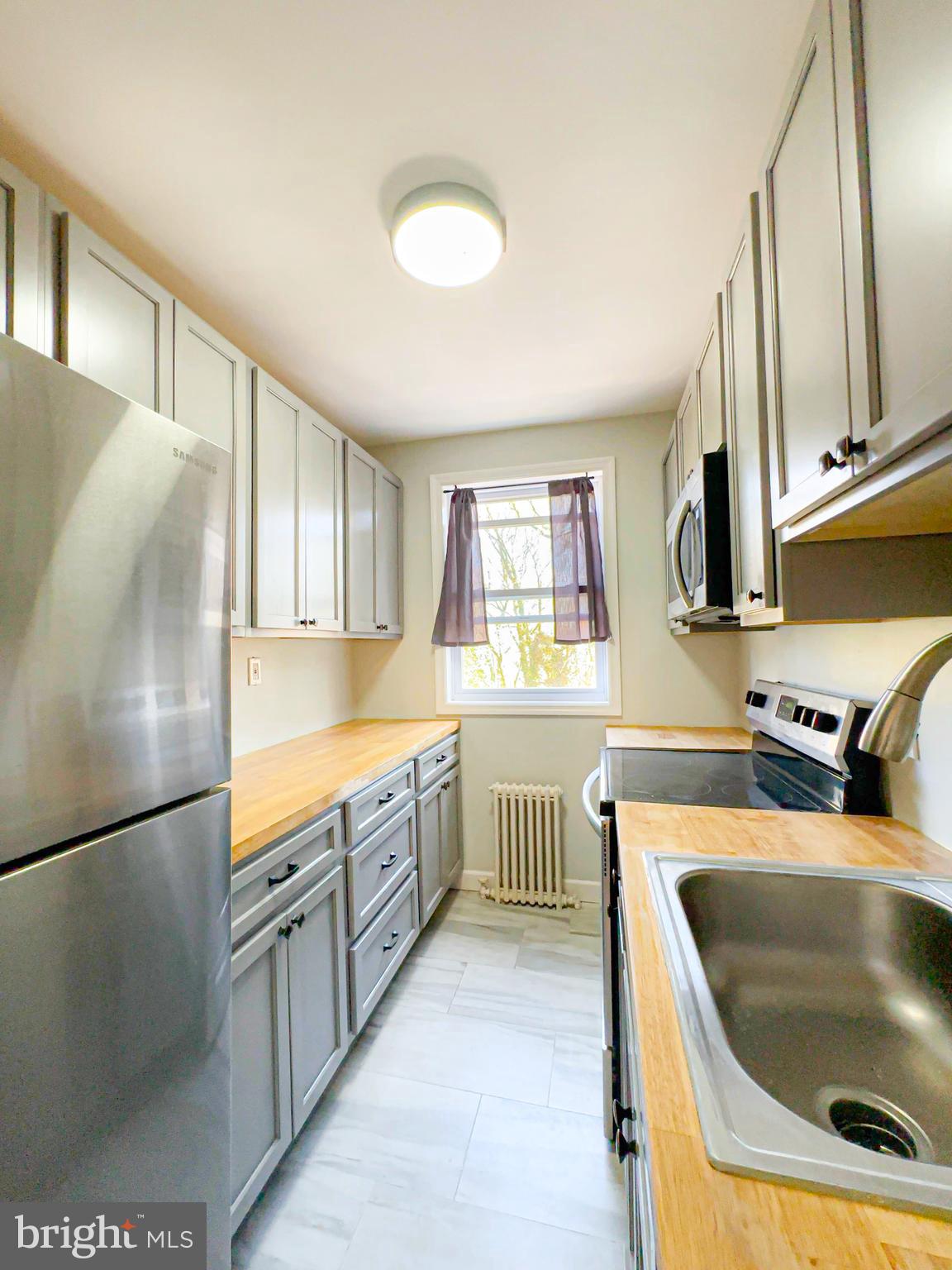 514 Ridge Road Southeast, Unit 311 Washington, DC 20019 - Photo 6 of 26 Kitchen
