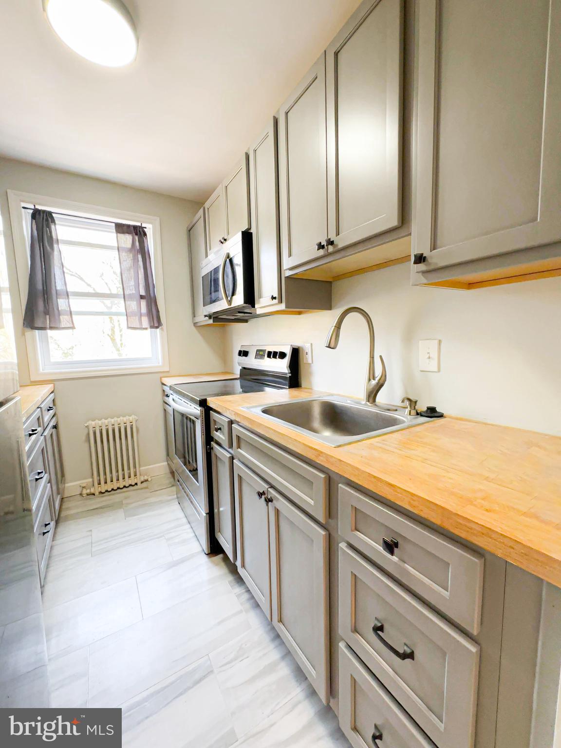 514 Ridge Road Southeast, Unit 311 Washington, DC 20019 - Photo 7 of 26 Kitchen