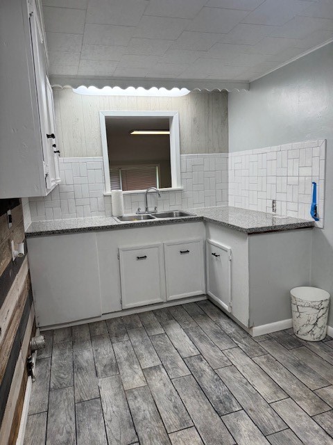 9004 Farm To Market 62 Corrigan, TX 75939 - Photo 21 of 27 a kitchen with a sink and cabinets